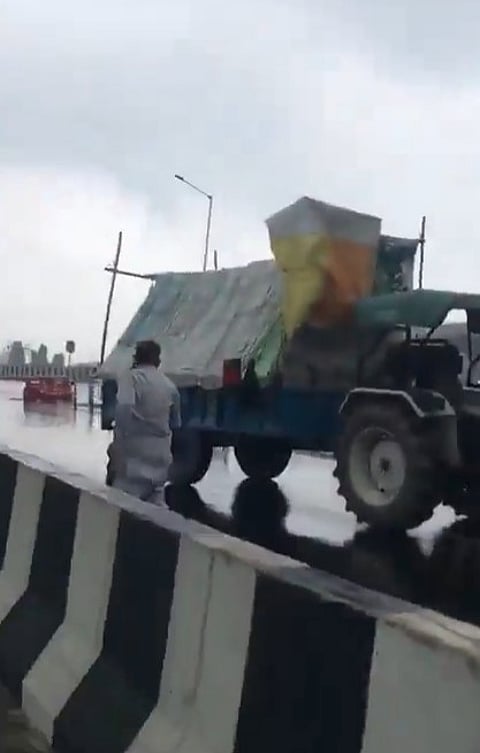 One of the purported videos said to be of the incident shows an occupant managing to get out of the car amid the attack and running to save his life